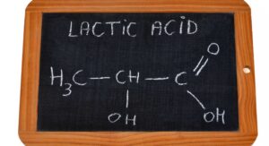 Lactic acid with scientific code on a chalk board