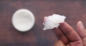 White petroleum jelly on a the hand